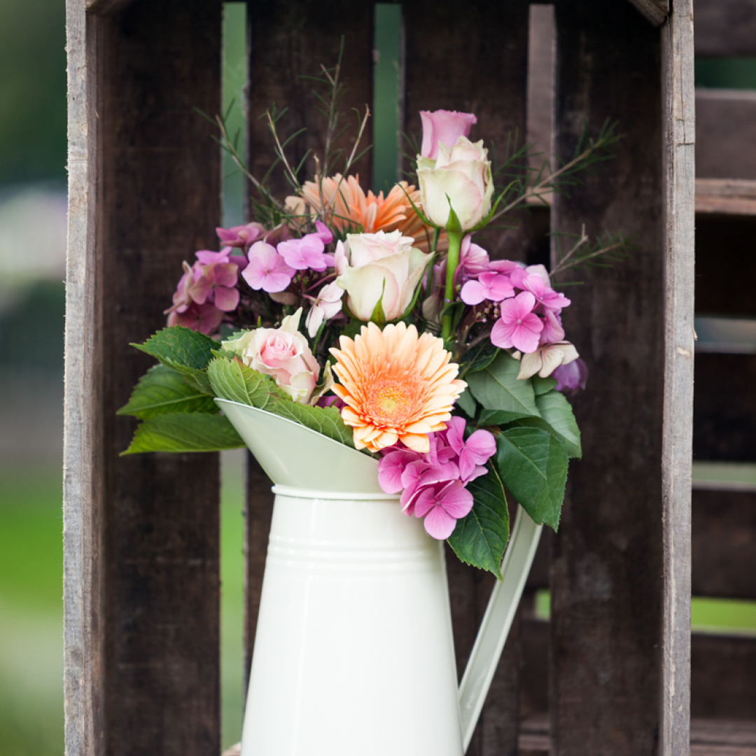Apple crates, flowers in milk urn, English Country Garden Wedding